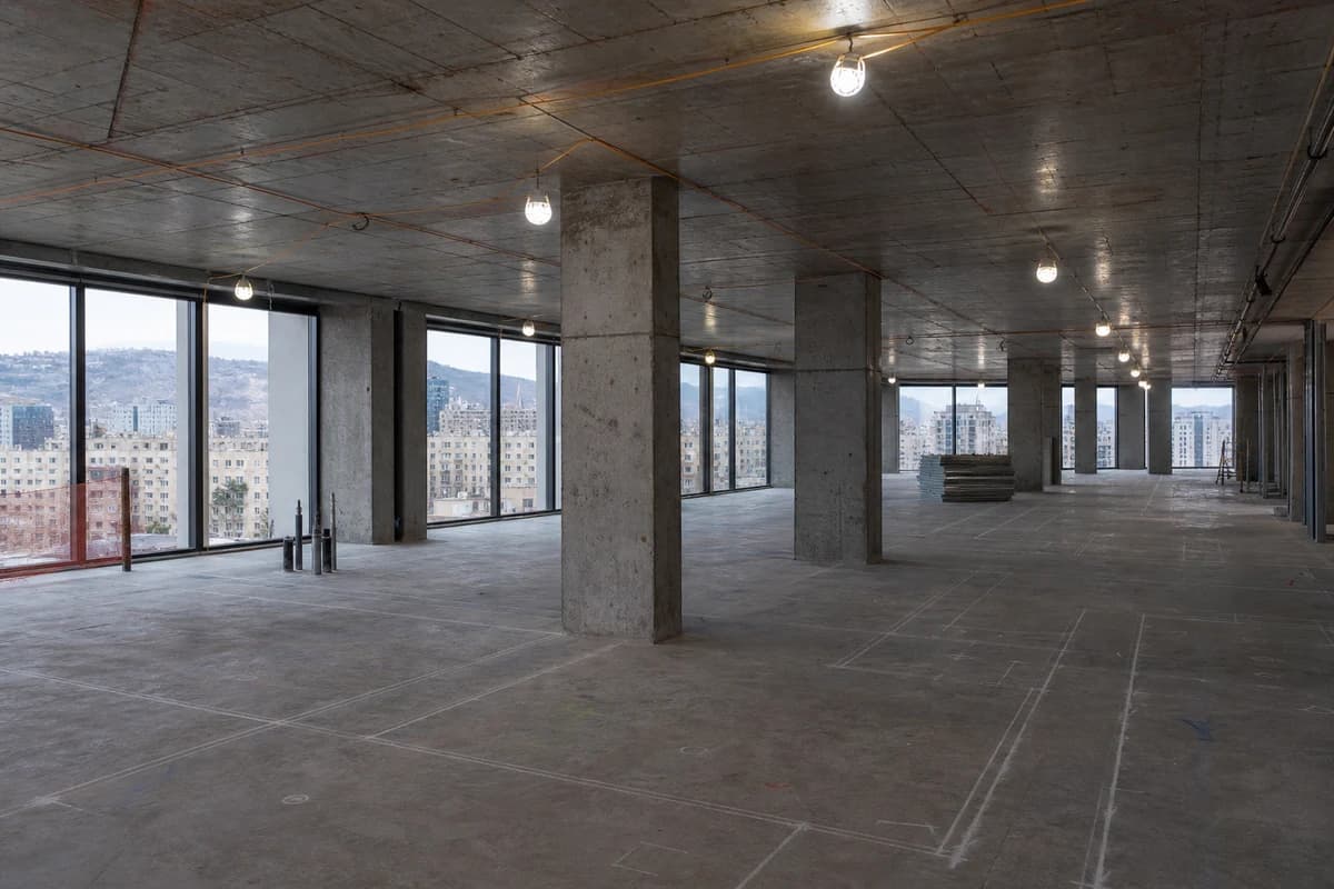 Empty commercial office shell in Damascus before tenant office fit-out begins