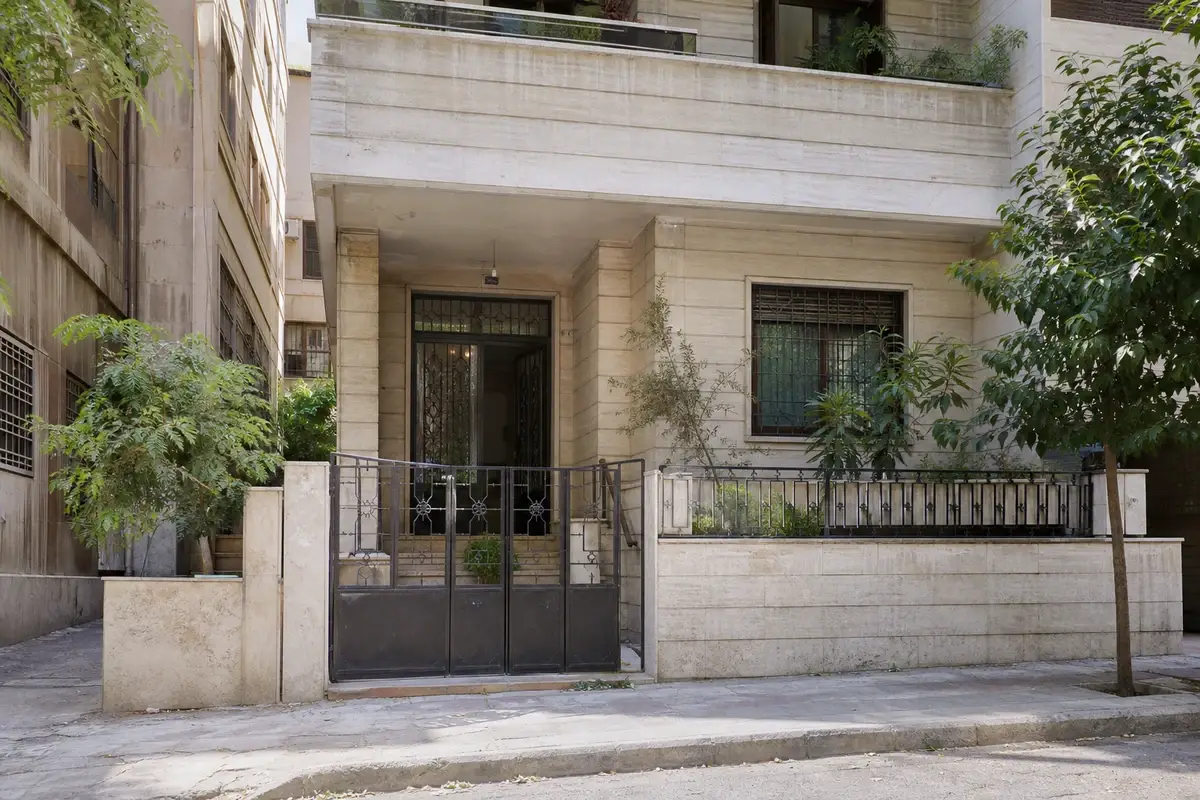 Damascus residential building exterior photographed for a remote construction quote Syria briefing pack