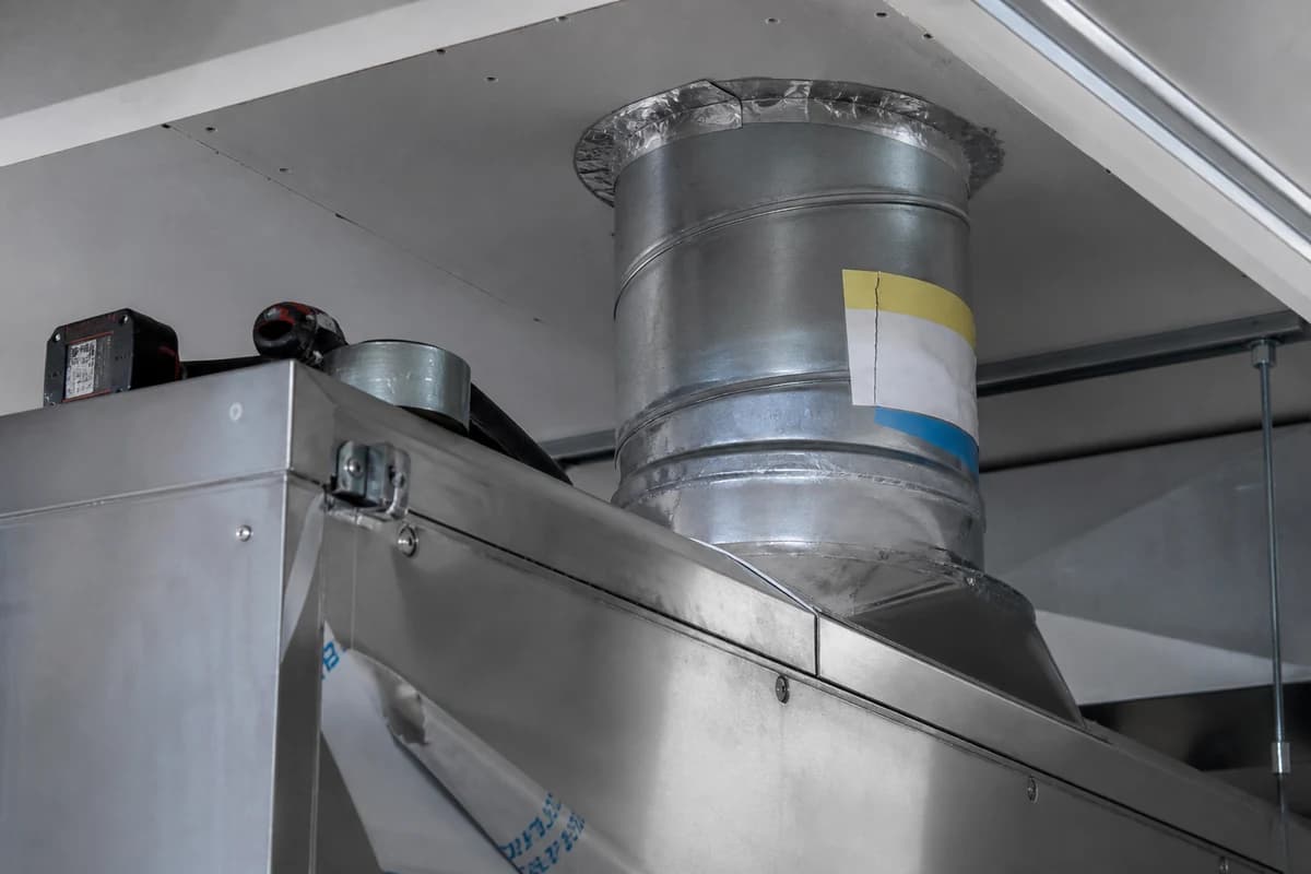 Detail of kitchen extract duct joints during restaurant fit-out Syria hold-point inspection